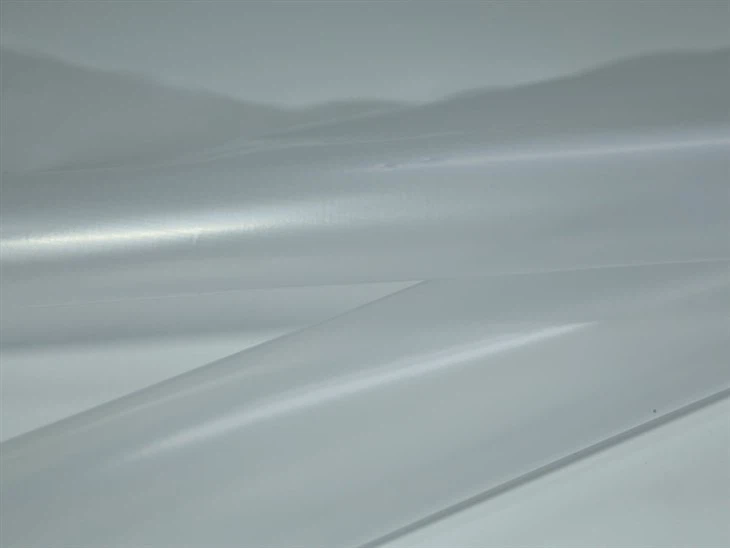 hot melt adhesive sheet for bonding the back of the carpet